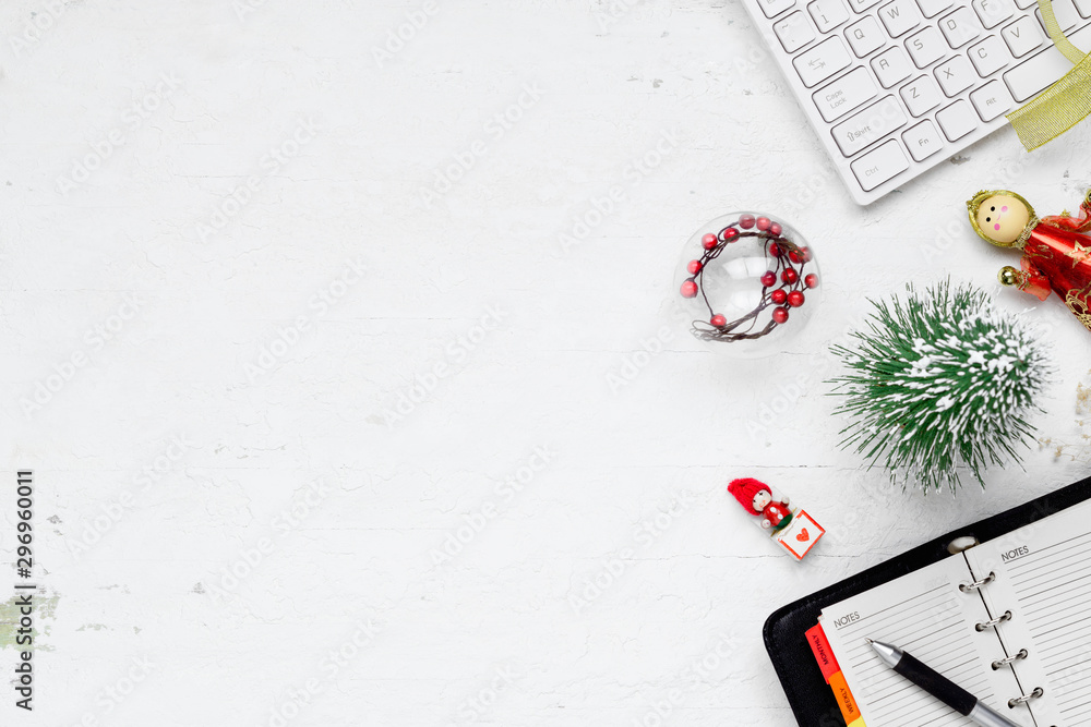 Poster merry christmas and happy new years office work space desktop concept. flat lay top view with keyboa