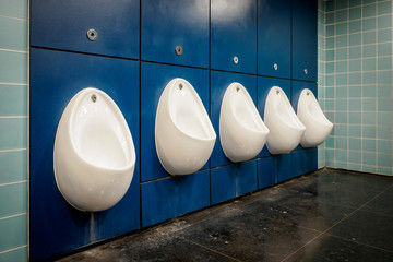 Raw of urinals in a toilet in the South Bank Art Centre. Landscape format.