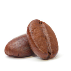 Coffee beans Isolated on white. Soft focus closeup view.