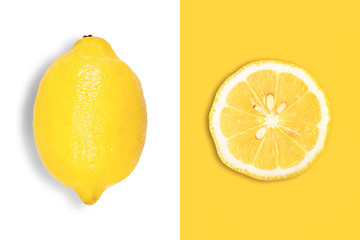Creative layout made of big lemon and slice. Flat lay. Food concept.