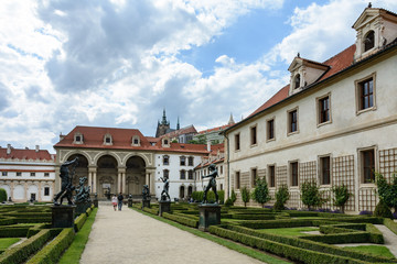 Fototapeta na wymiar The Wallenstein Palace stands near the Vltava River in the northern part of the Lesser Country. Alleys of the garden are decorated with copies of sculptures of Adrien de Vries on mythological themes.