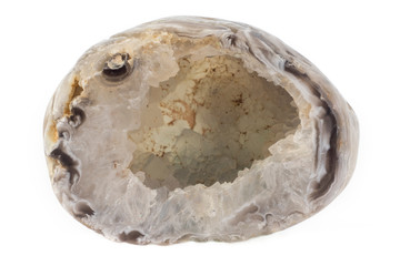 Small quartz geode from Brazil isolated on a pure white background.