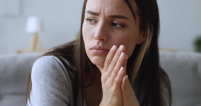Sad young woman worried face having problem feeling depression