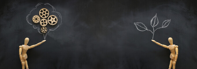 business concept of man hand with drawn small plant on blackboard. growth, teaching and vision...