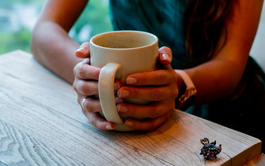  girl with a cup of coffee