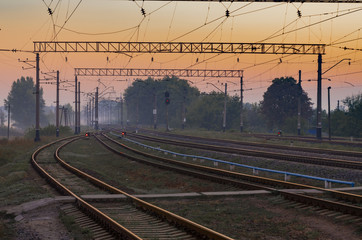 Fototapeta na wymiar Empty railway station on sunrise
