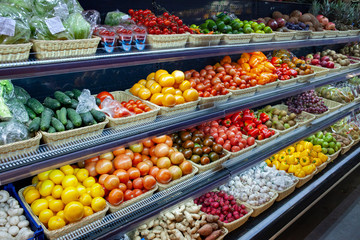 Fresh organic Vegetables and fruits on shelf in supermarket, farmers market. Healthy food concept....