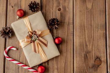 Christmas presents with ribbon on dark wooden background in vintage style