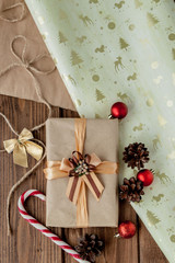 Christmas presents with ribbon on dark wooden background in vintage style