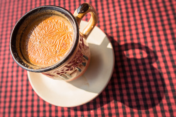 Masala tea. Traditional Indian tea Masala with milk and spices. Beautiful cup of ethnic hot drink in India.