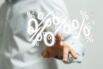 hand touches virtual percent icon