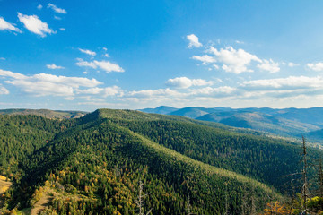 Beautiful mountain landscape, with mountain peaks covered with forest and a cloudy sky. Ukraine mountains, Europe