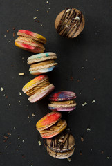 colorful macaroons on dark background