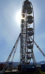 Ferris Wheel Silhouetted against the sun