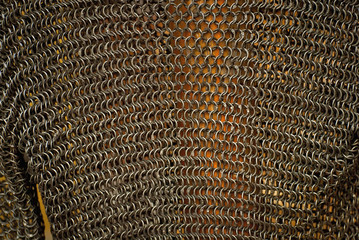 Knights armor closeup. Texture of medieval chain mail. The authentic outfit was recreated by the reconstruction masters.