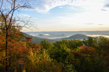 View of the fog covered valley below. Taken from the top of Morrow Mountain State Part NC