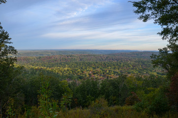 Fototapeta na wymiar View of the valley from the top of Morrow Mountain State park nc during fall.