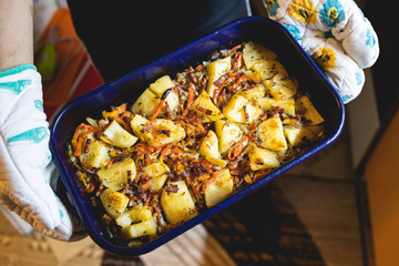 Homemade stew with potato baked in the oven