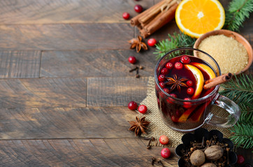 Christmas Mulled Red Wine with Orange, Cranberries and Spices. Holiday Concept.