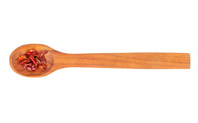 Dry red pepper in spoon