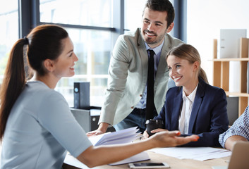 Office employees having business training at workplace