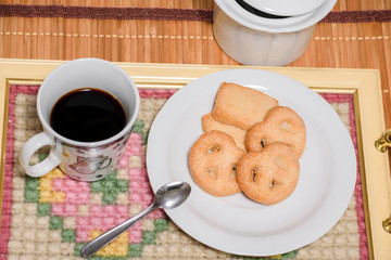 cup of coffee with biscuits