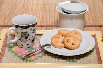 cup of coffee with biscuits