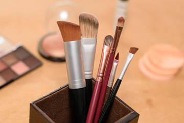 makeup product. eye shadow , makeup brush
