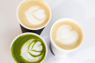 various of tea and coffee cups  top view on a white background