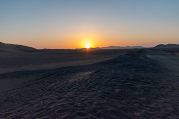 Fototapeta na wymiar Sunset over the desert - Iran