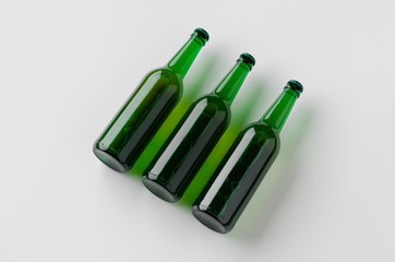 Green longneck beer bottle mockup. Three bottles.