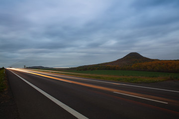 Light trails on the road in Central Bohemian Highlands, Czech Republic.