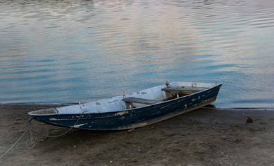 Artistic photography, boat by the river