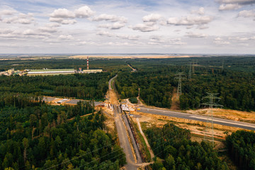 Aerial drone photography of a highway construction site.