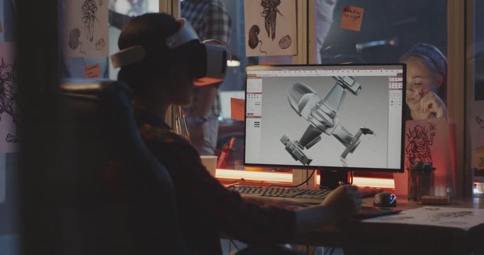 Woman modeling an airplane on computer