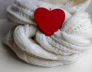 Valentine heart on a white scaf. Background for Valentines day greeting card, concept of romantic celebration