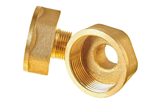 Two glossy brass fittings golden color with thread for connecting different diameter pipeline for oil, petrol, gas, water or other liquid isolated on white background without shadow. Close-up