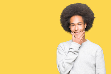 Fototapeta na wymiar Young african american man with afro hair wearing sporty sweatshirt looking confident at the camera with smile with crossed arms and hand raised on chin. Thinking positive.