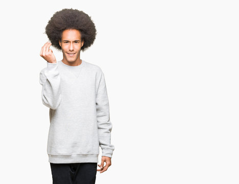 Young African American Man With Afro Hair Wearing Sporty Sweatshirt Doing Italian Gesture With Hand And Fingers Confident Expression