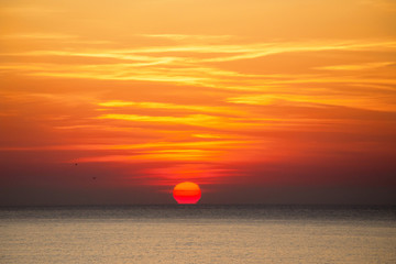 Picturesque yellow-red sunrise over the sea. Black Sea, Bulgaria