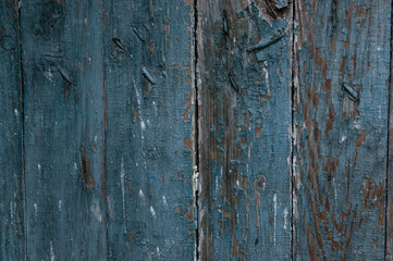 Blue wooden boarded wall with cracked paint background