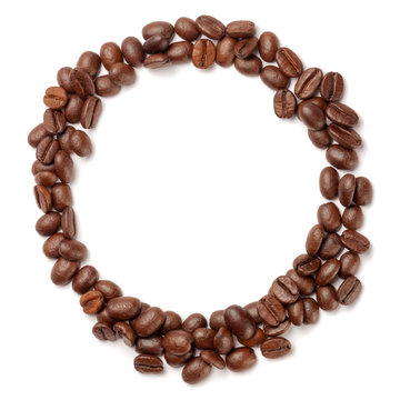 Coffee beans in form of ring. Isolated on white. Coffee background.