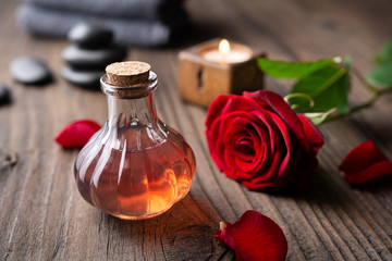 Obraz na płótnie Canvas Fresh homemade infused rose water in a glass bottle for skin care routine