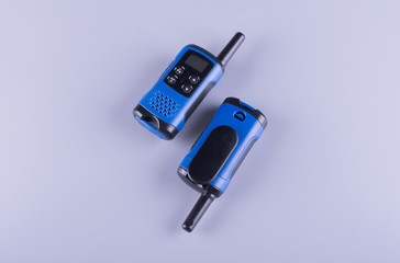two blue walkie-talkies