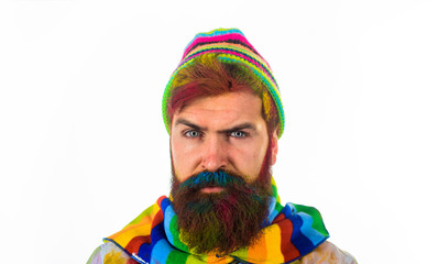 Bearded man in autumn style. Seasonal fashion concept. Bearded man in trendy colorful scarf and hat. Autumnal vogue trend. Comfortable autumn outfit. Bearded man in colorful clothing. Autumn fashion.