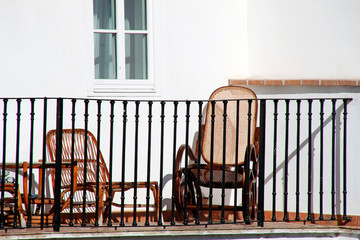 Obraz na płótnie Canvas wicker furniture for relaxing on the balcony