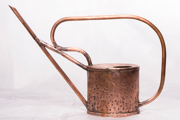 old watering can isolated on white © Максим Точилкин