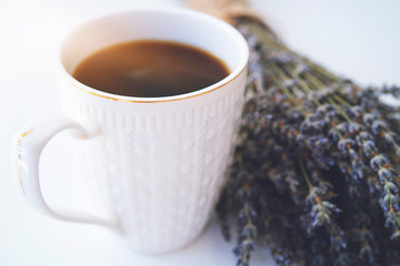 Coffee cup on white table. Good morning. Tasty coffee. Cappuccino. Caffeine. Love for coffee. Lavender. Aroma of lavender. Aroma of coffee. cafe.