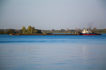 Large white cruise ship sailing on water