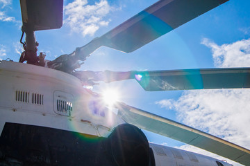 Naklejka premium Helicopters on a landing site against a blue sky